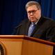 US Attorney General, William Barr (L), and FBI Deputy Director David Bowdich (R) hold a press conference, regarding the December 2019 shooting at the Pensacola Naval air station in Florida, at the Department of Justice in Washington, DC on January 13, 2020.